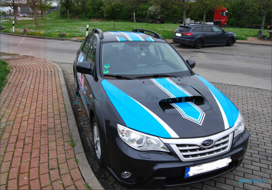 Bild vom Kundenauftrag Es wird das fertige Auto von vorne leicht links Beifahrerseite gezeigt