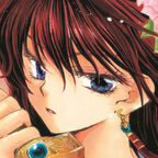 junges Mädchen mit lange roten Haaren und Blumen im Haar