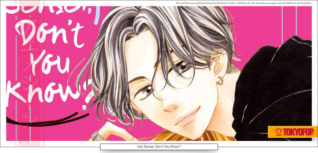 Eine junge Frau mit langen blonden Haaren wird von einem starken Mann in die Arme genommen.