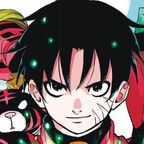 Das Bild zeigt einen jungen Mann mit schwarzen Haaren und Tato Gesicht. Eine schwarze Katze wird ebenfalls gezeigt.