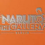 Ein oranges Cover mit silberner Prägung.