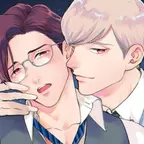 Das Bild zeigt zwei Männer in einer sinnlichen Pose.